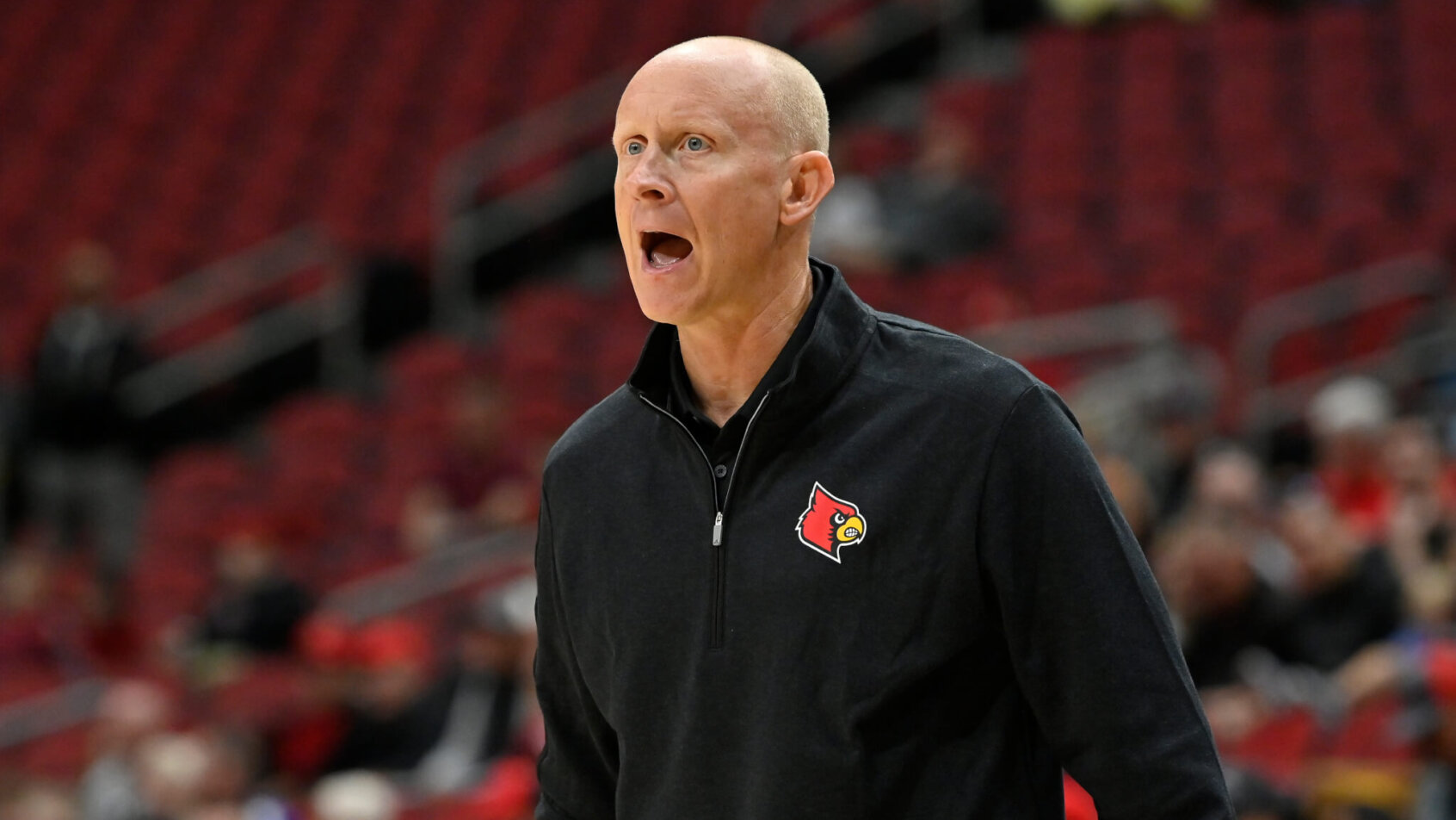 Louisville head coach Chris Mack shouting instructions