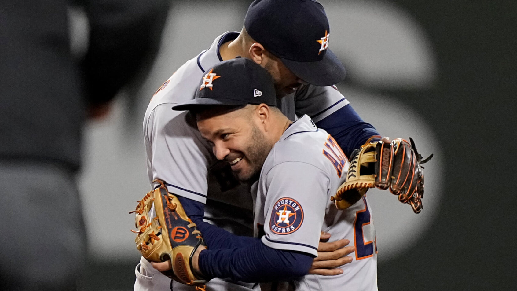 Jose Altuve and Carlos Correa embrace