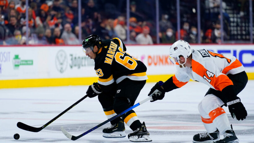 Brad Marchand controls puck versus Flyers