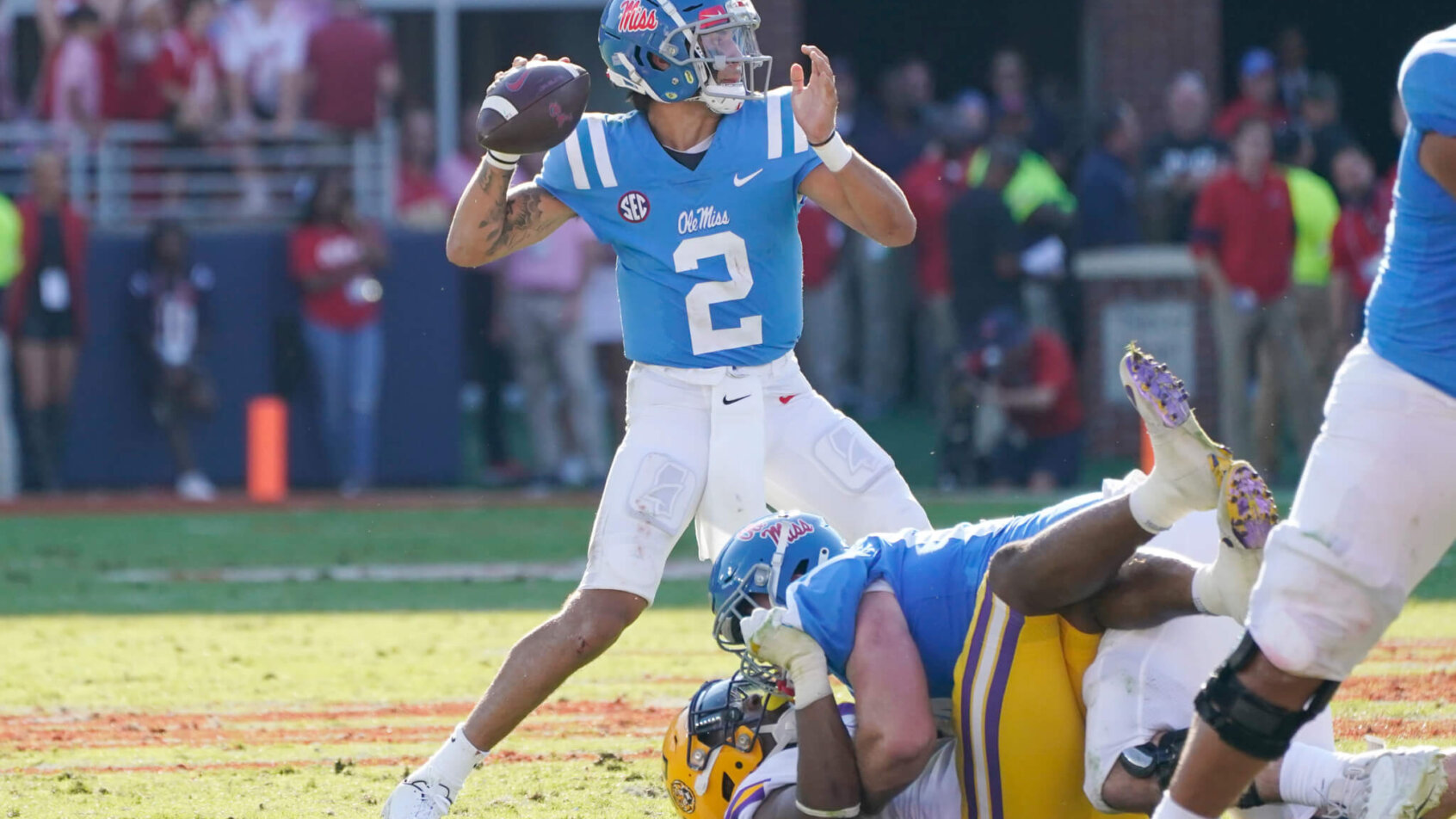 Matt Corral throwing a pass