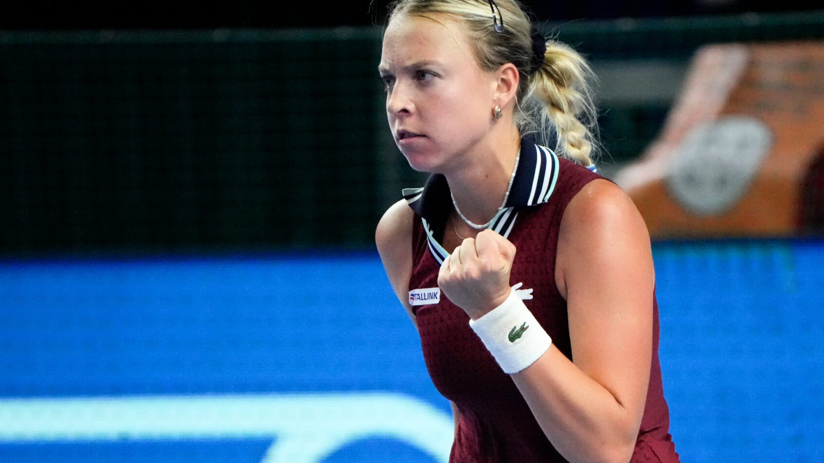 Anett Kontaveit celebrates a winning point