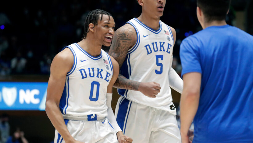 Duke celebrates on their way back to the bench
