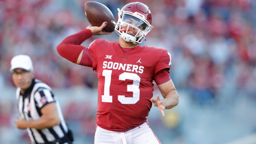 Caleb Williams throws on the move