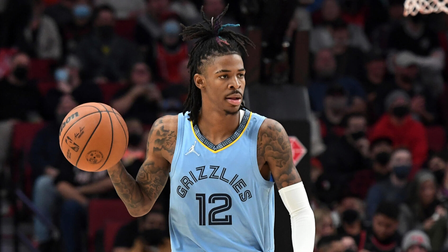 Ja Morant dribbles up court