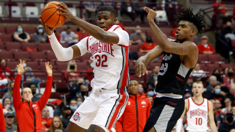 Ohio State forward E.J. Liddell grabbing a rebound