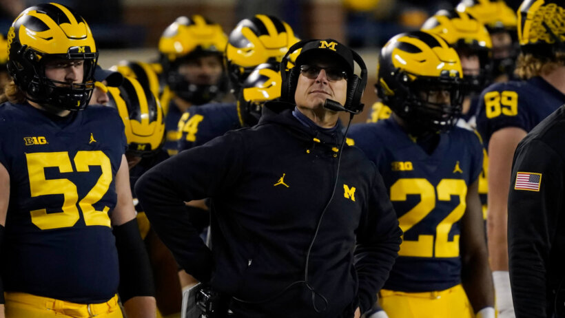Michigan head coach Jim Harbaugh on the Wolverine sideline