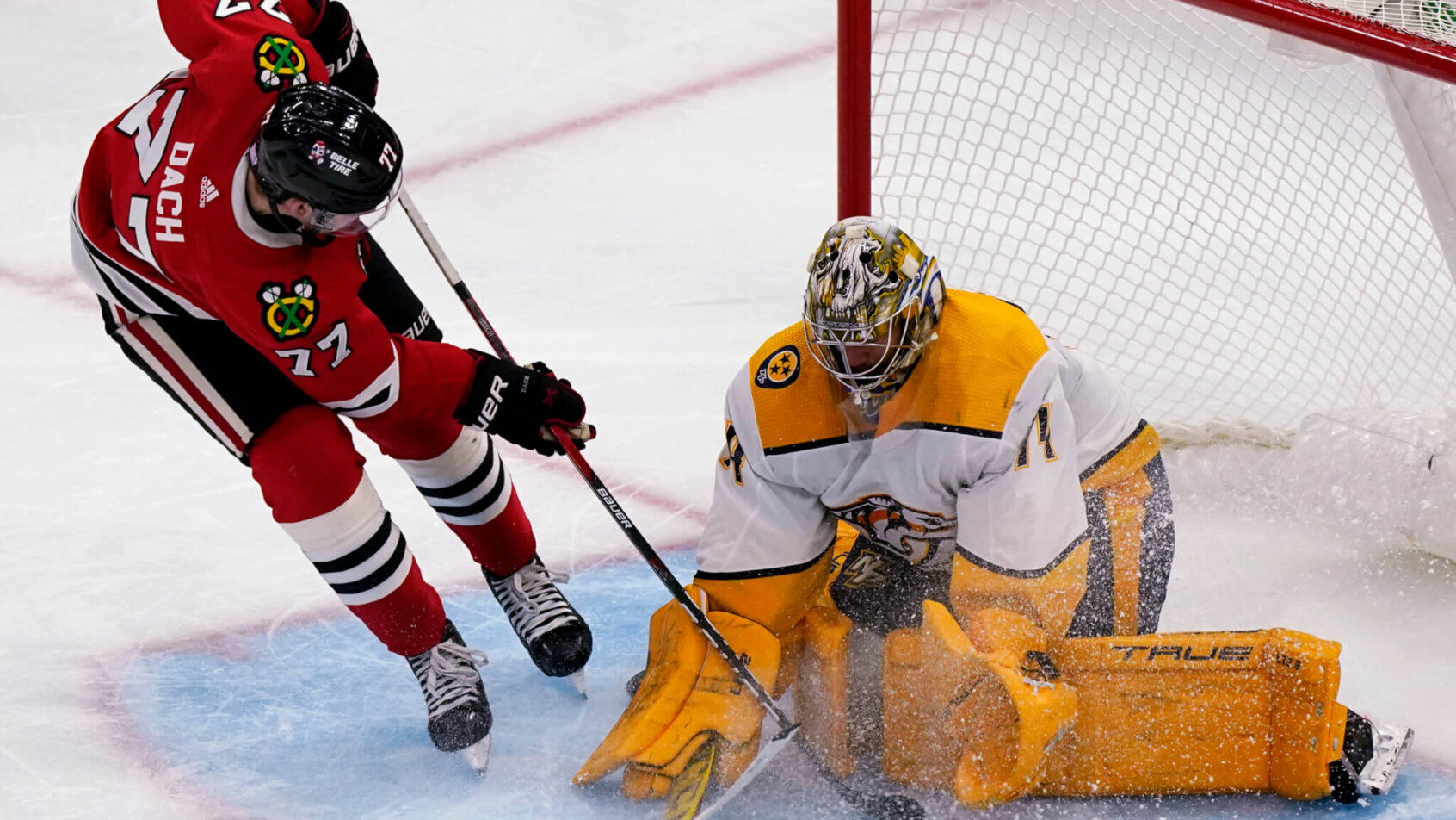Juuse Saros stops shot by Kirby Dach