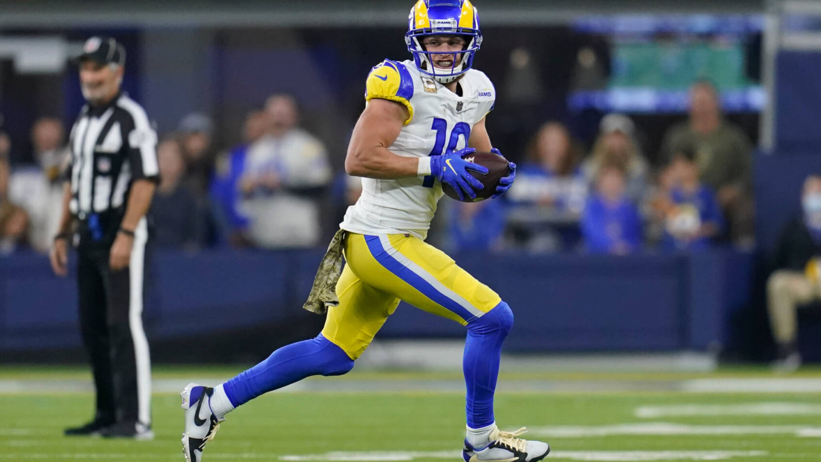 Cooper Kupp running with football