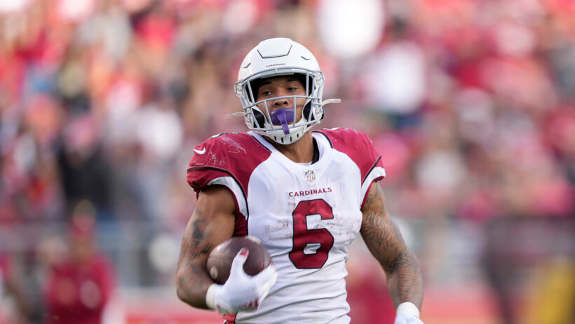 James Conner running with football