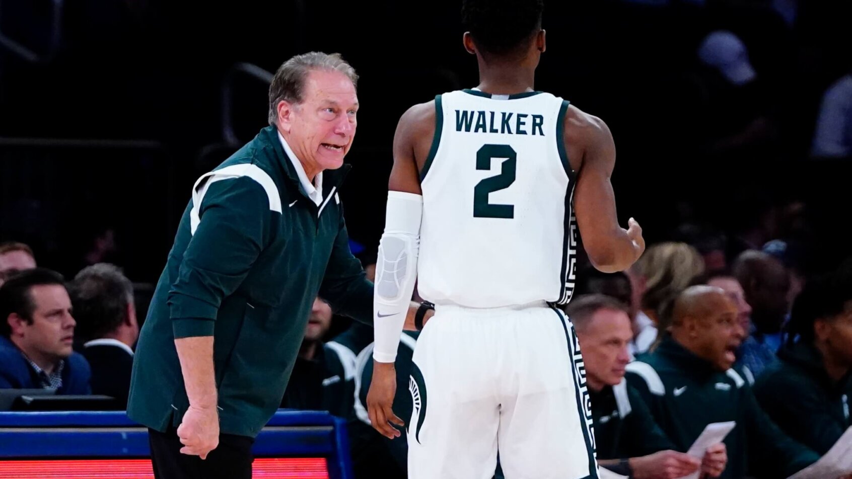 Michigan State head coach Tom Izzo talks to Tyson Walker