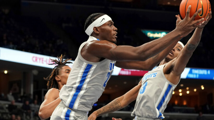 Memphis's Jalen Duren Landers Nolley ll go for a rebound