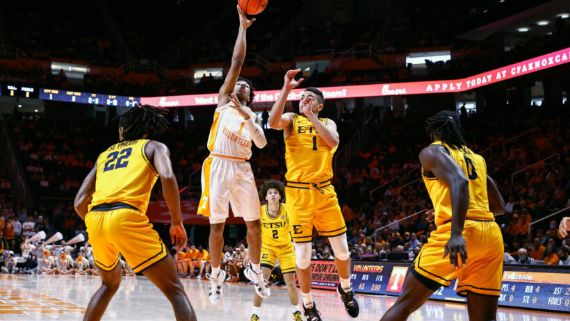 Kennedy Chandler shooting over defender