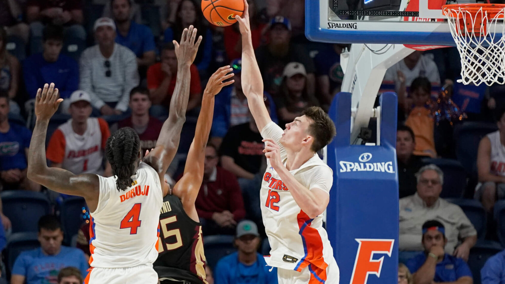 Florida player blocks an opponents shot near the rim