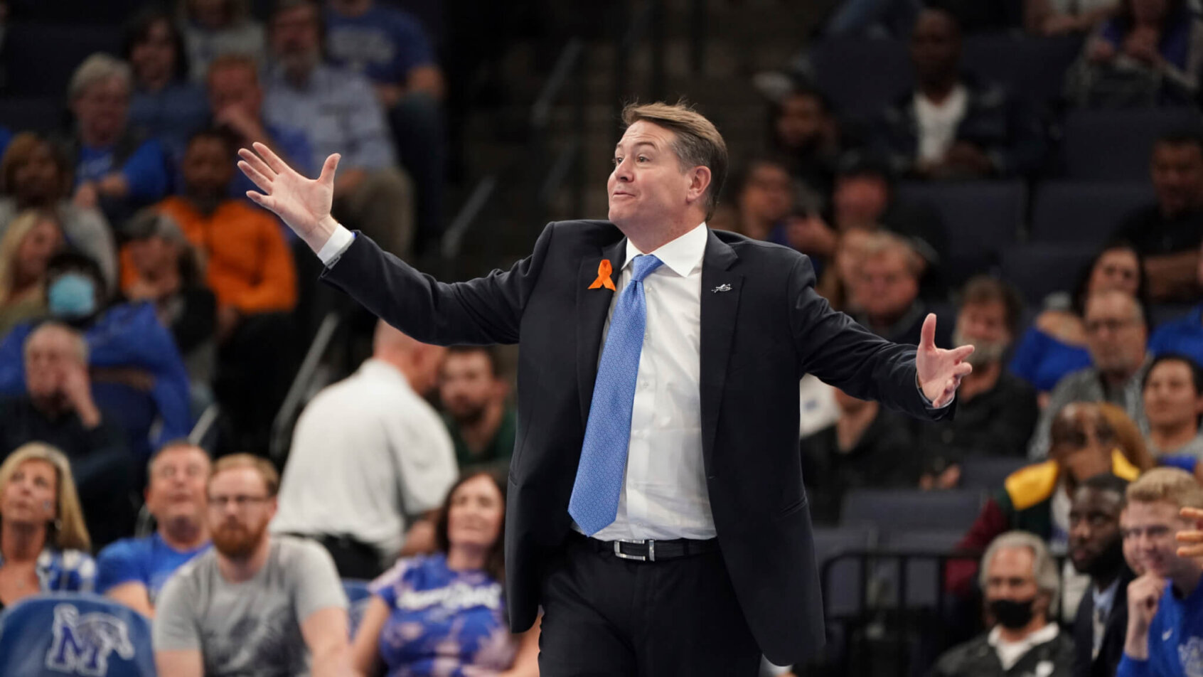 St. Louis Coach Travis Ford calling to his team