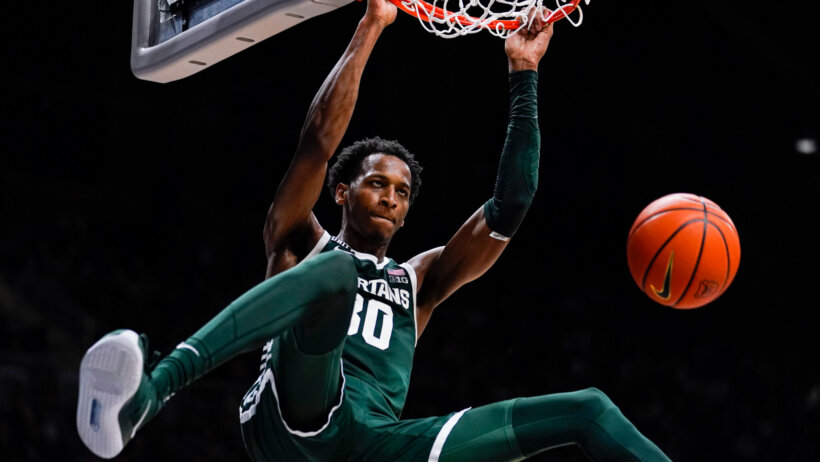Michigan State forward Marcus Bingham Jr. dunking