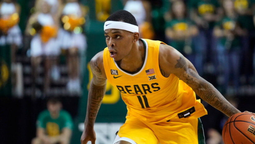 James Akinjo handles the ball for Baylor
