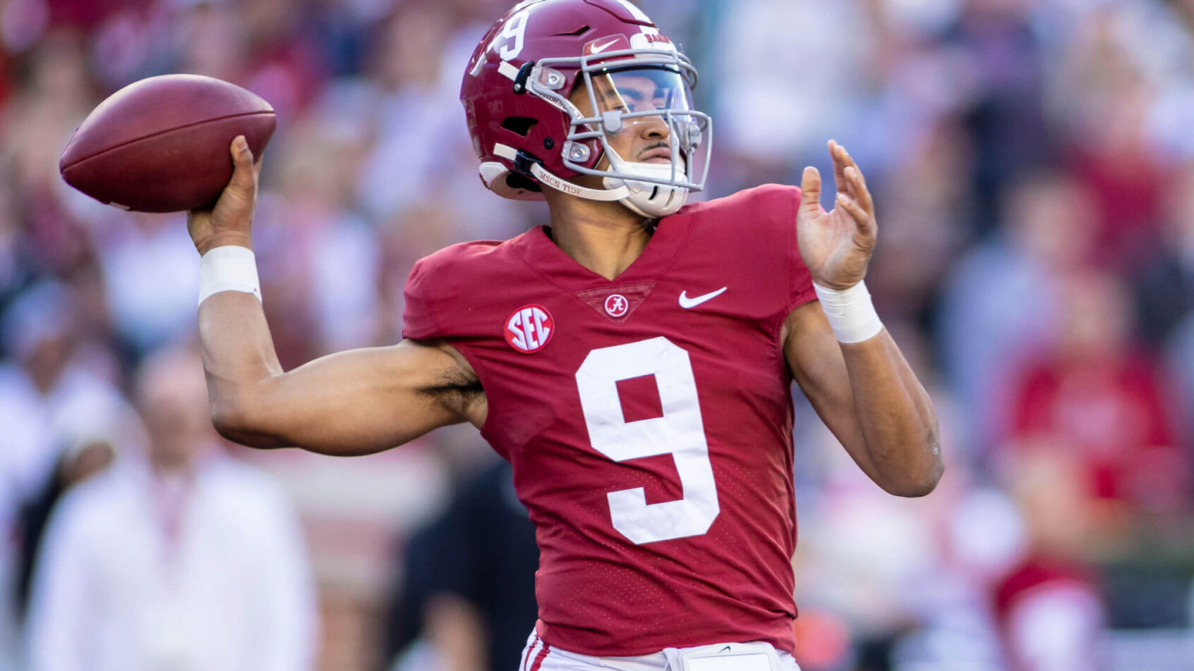 Alabama quarterback Bryce Young throwing a pass