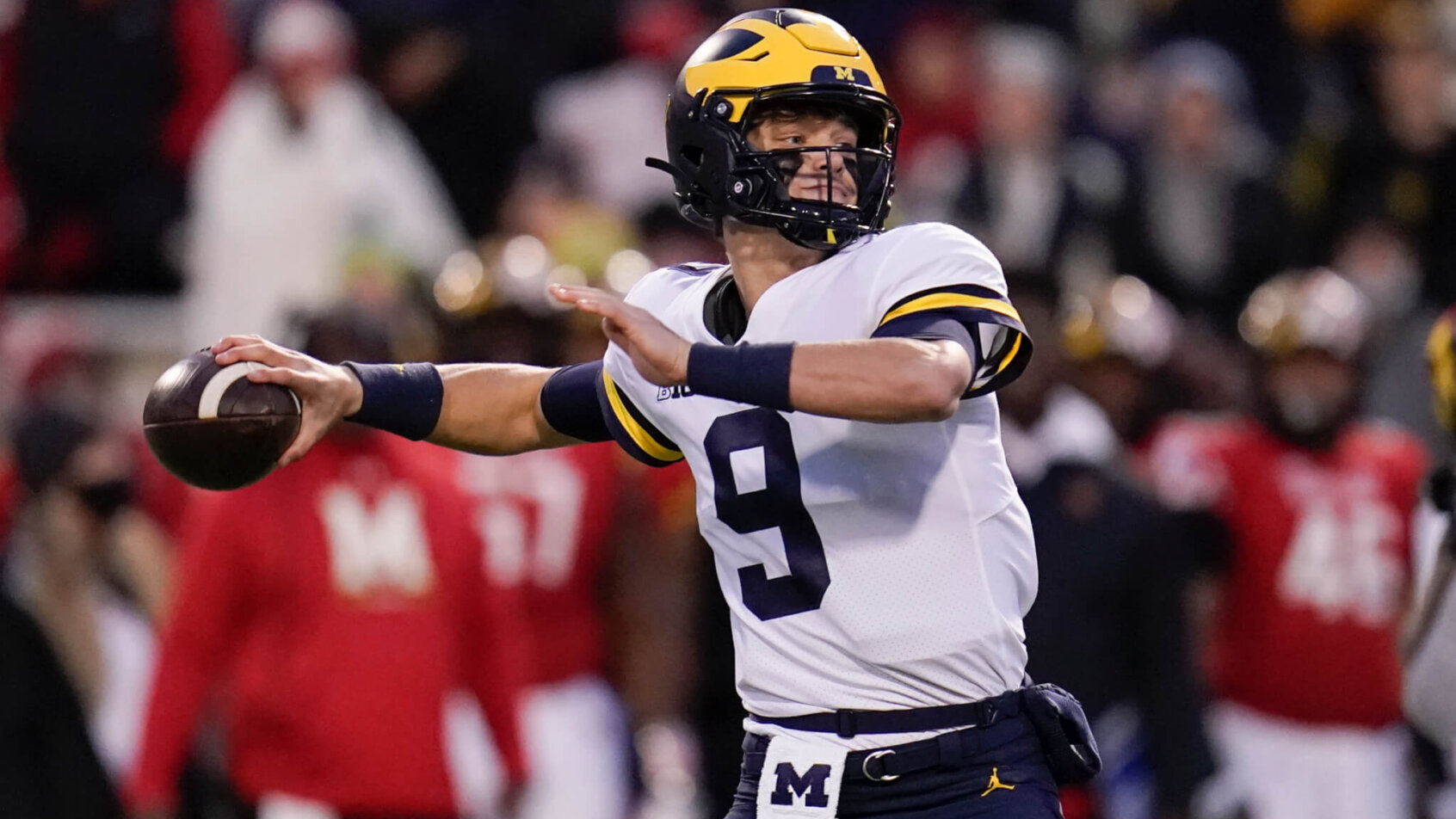 Michigan quarterback J.J. McCarthy throwing a touchdown pass