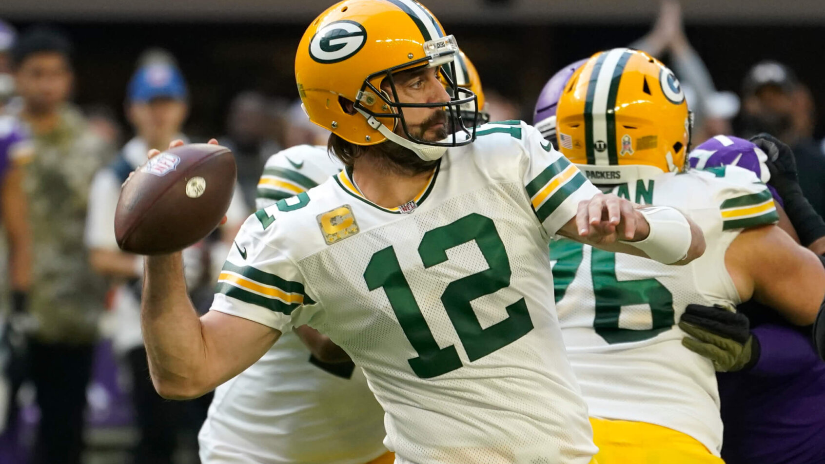 Aaron Rodgers launches a throw