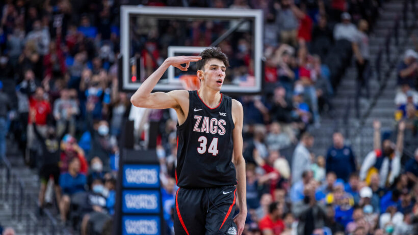 Chet Holmgren poses after knocking down a three