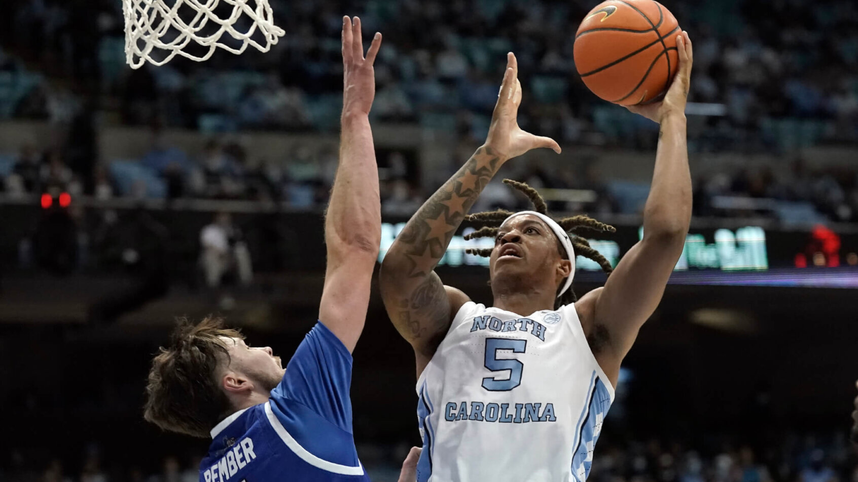 North Carolina forward Armando Bacot going up for a shot under the basket