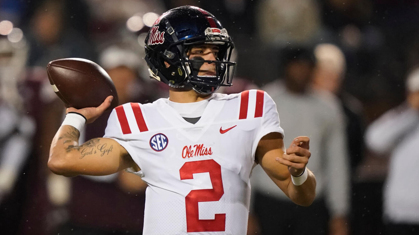 Matt Corral winds up to pass