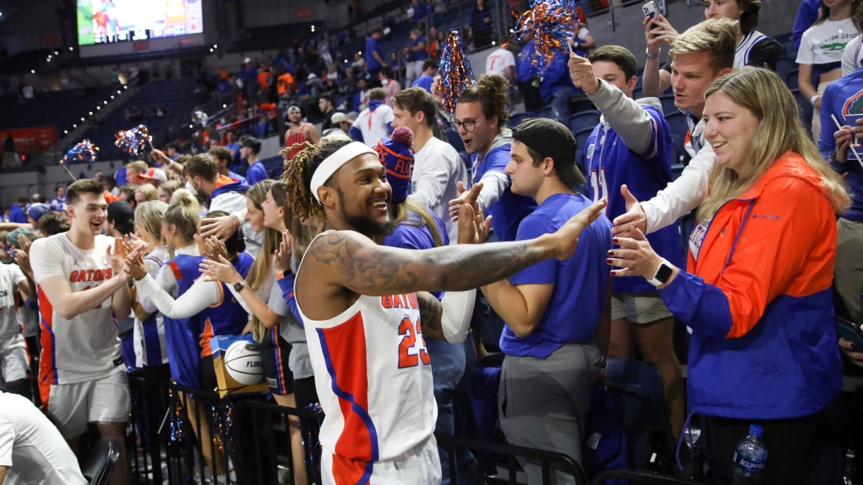 Florida guard Brandon McKissic celebrating with Gator fans