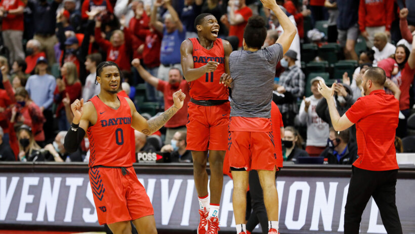 Dayton guards Elijah Weaver and Malachi Smith celebrating a win