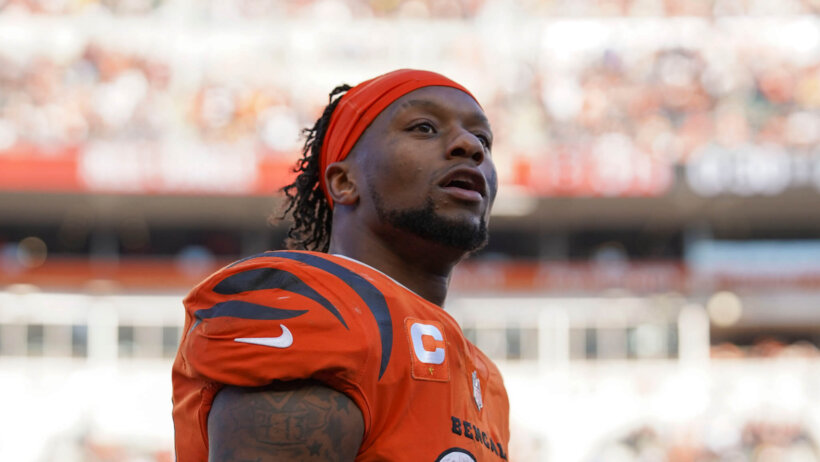 Cincinnati Bengals running back Joe Mixon standing on the field during a football game.