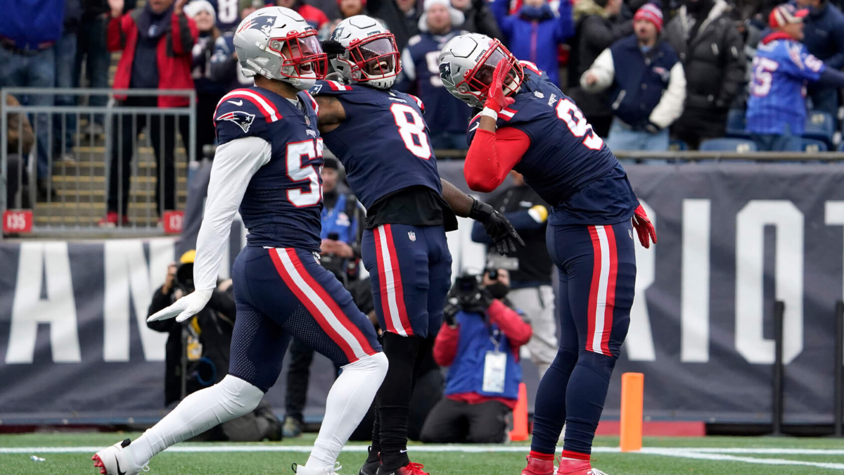 Patriots players celebrate dancing on the field