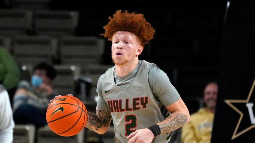 Elijah Davis brings the ball up court