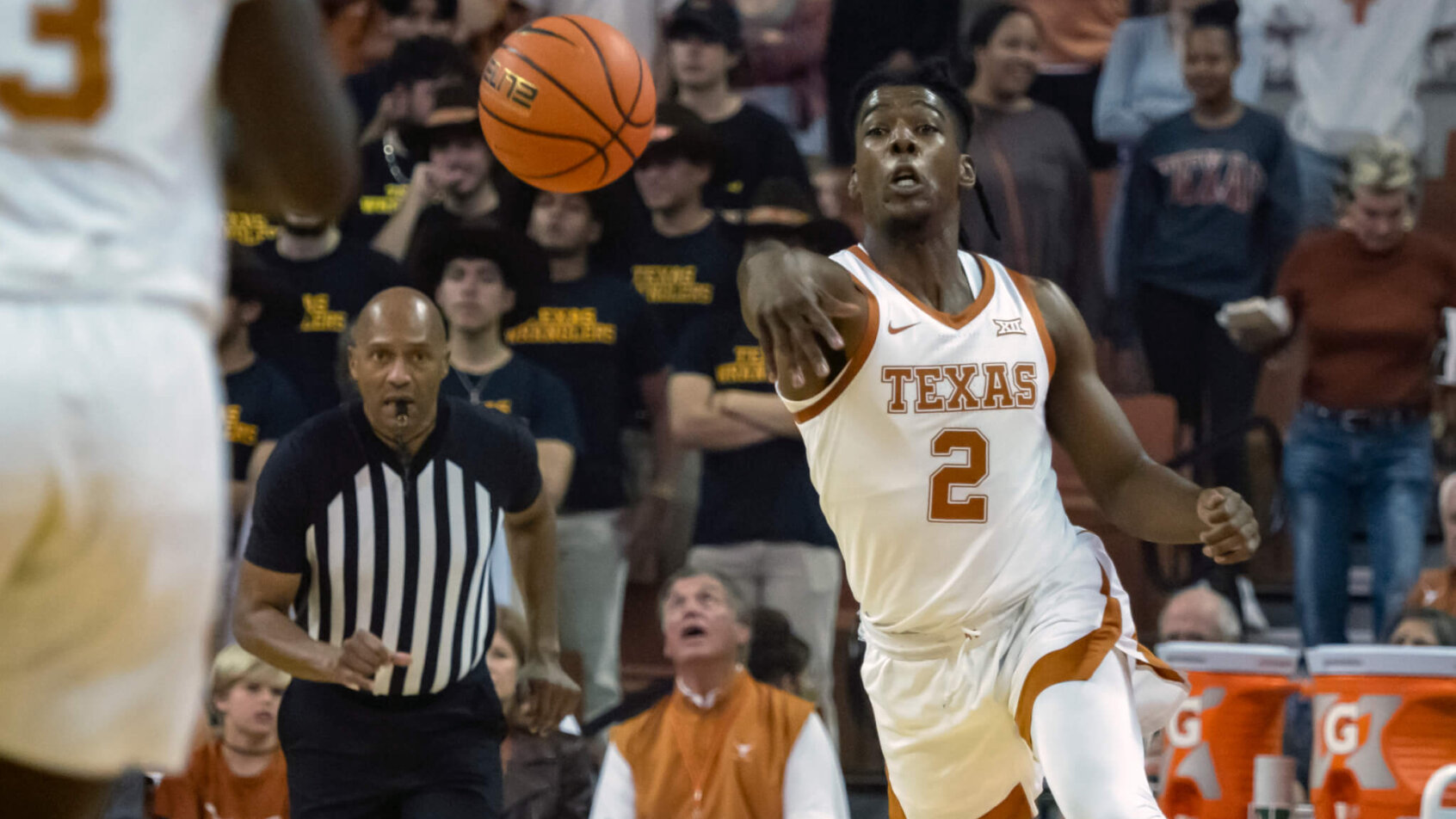 Texas guard Marcus Carr making a pass