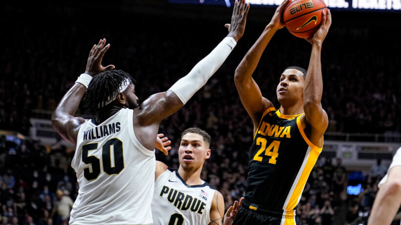 Trevion Williams rises up for a shot