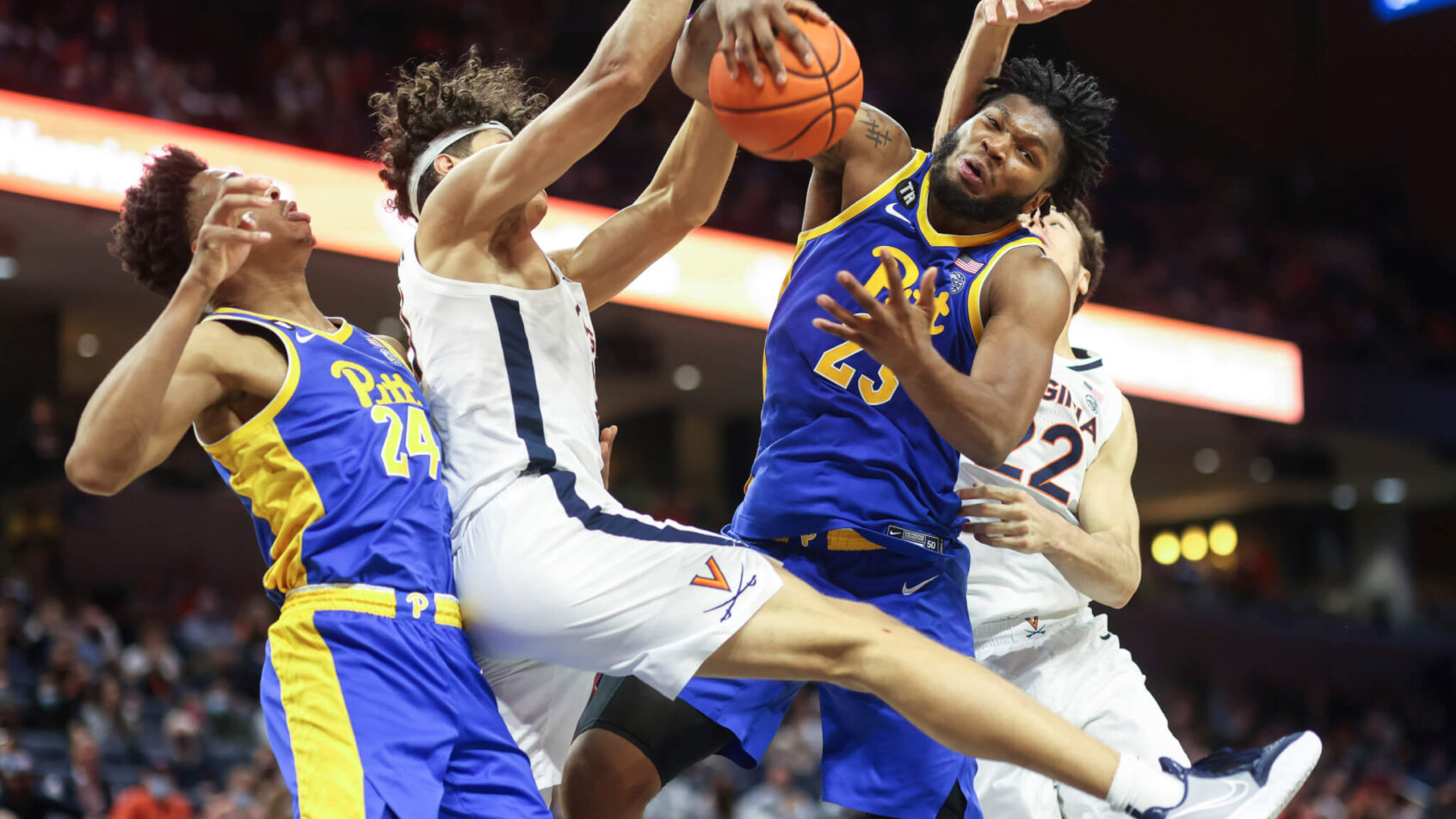 Pittsburgh forward John Hugley grabbing a rebound