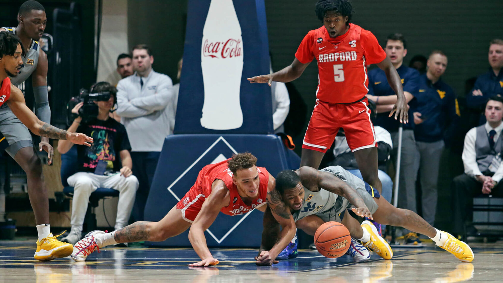 Radford center Lewis Djonkam fighting for a loose ball
