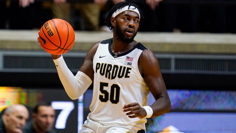 Purdue forward Trevion Willi dribbling