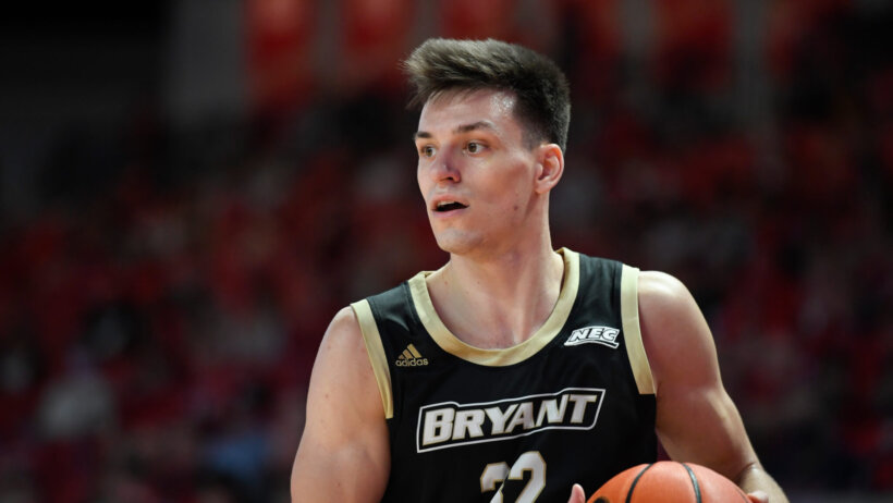 Bryant guard Peter Kiss dribbling