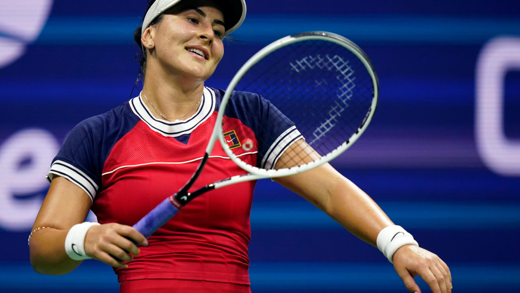 Bianca Andreescu reacting to a call during a tennis match.