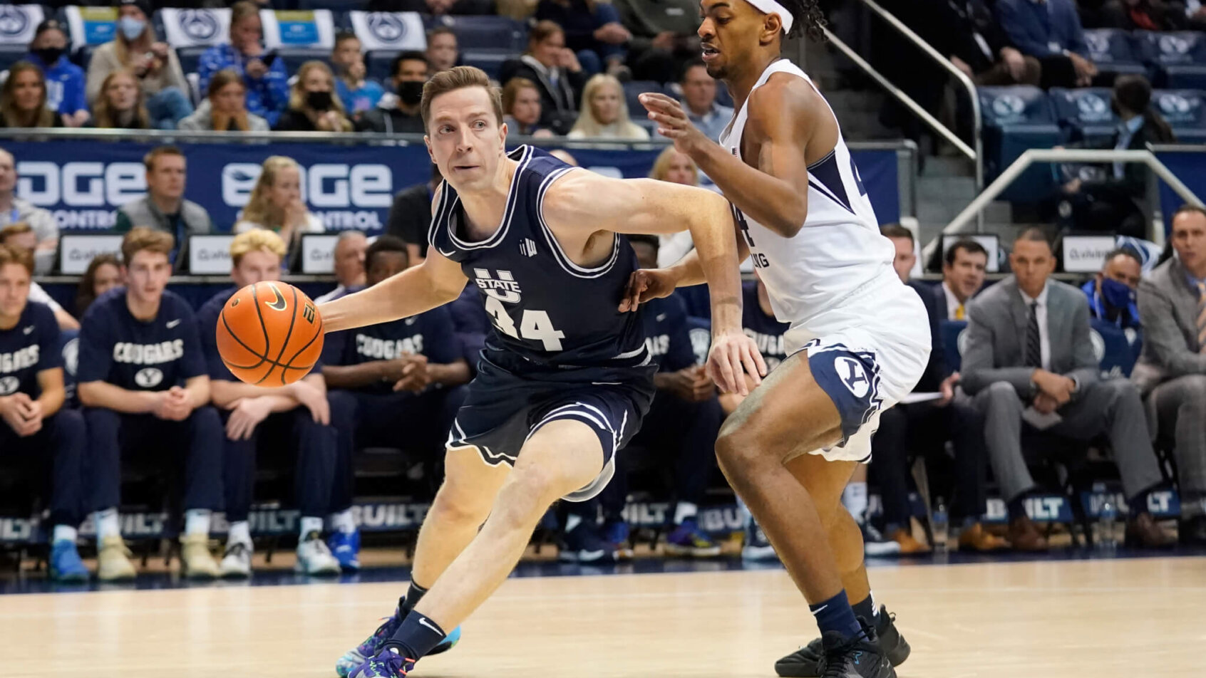 Utah State forward Justin Bean driving to the hoop
