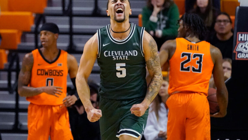 Tre Gomillion celebrates a bucket