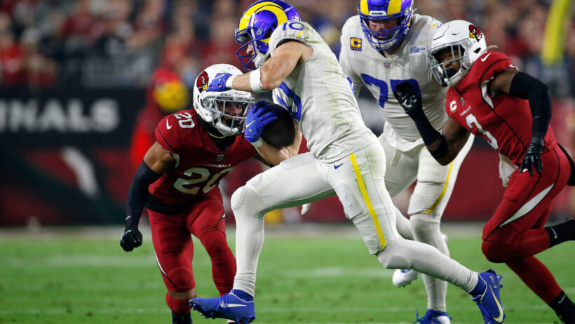 Los Angeles Rams wide receiver Cooper Kupp running with the ball during a football game.