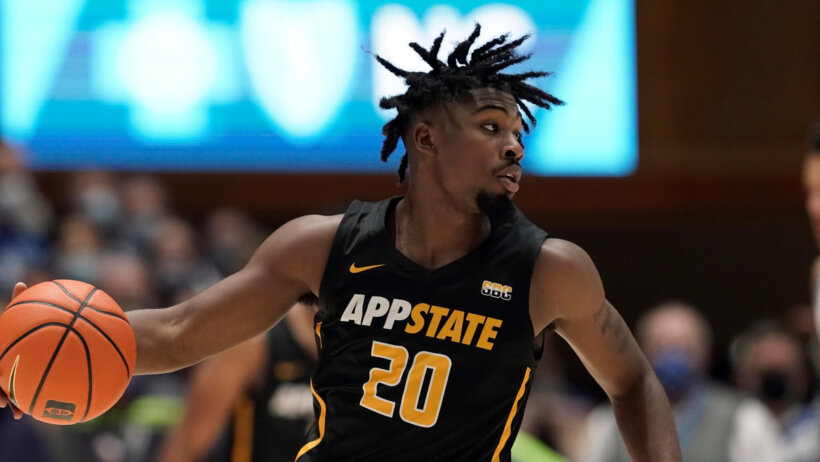 Appalachian State guard Adrian Delph dribbling