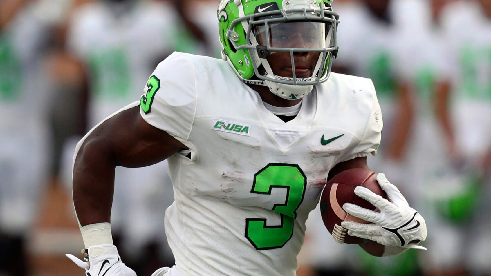 UNT RB carries the ball