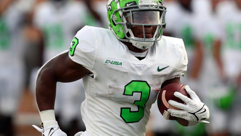 UNT RB carries the ball