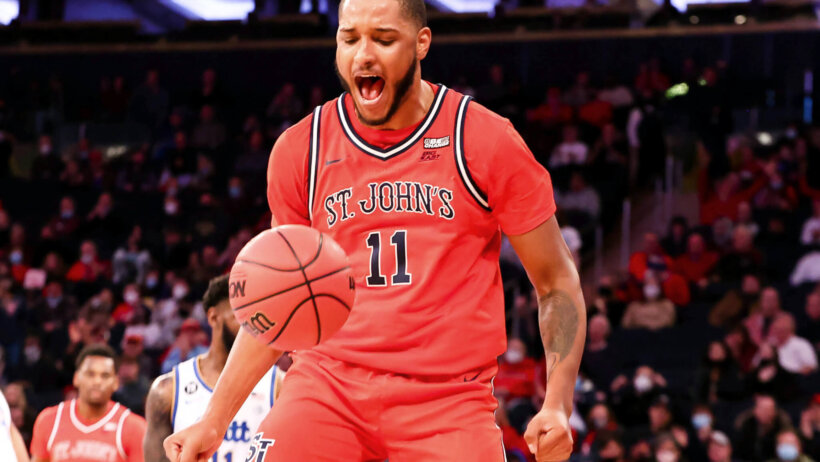 St. John's center Joel Soriano celebrating after a dunk
