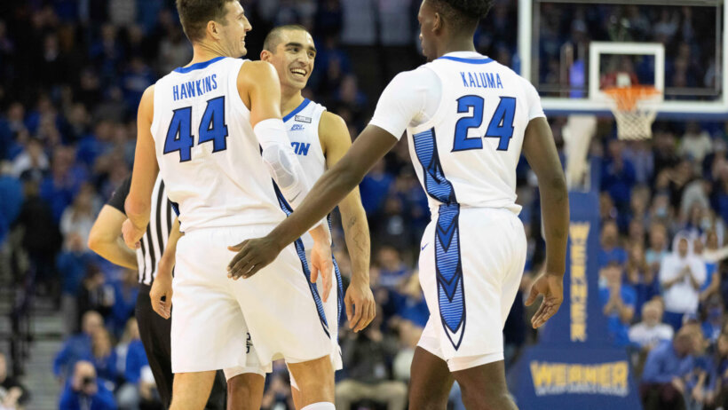 Creighton teammates celebrating a made basket