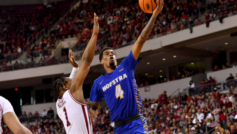 Hofstra guard Aaron Estrada goes for a layup
