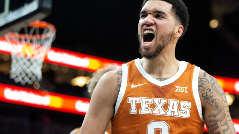 Texas forward Timmy Allen celebrates after a basket