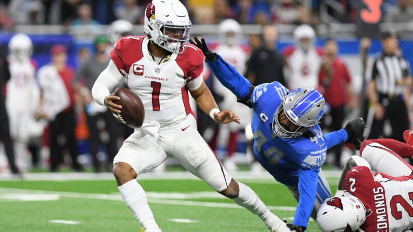Jalen Reeves-Maybin of the Detroit Lions pressuring Arizona Cardinals quarterback during an NFL game.