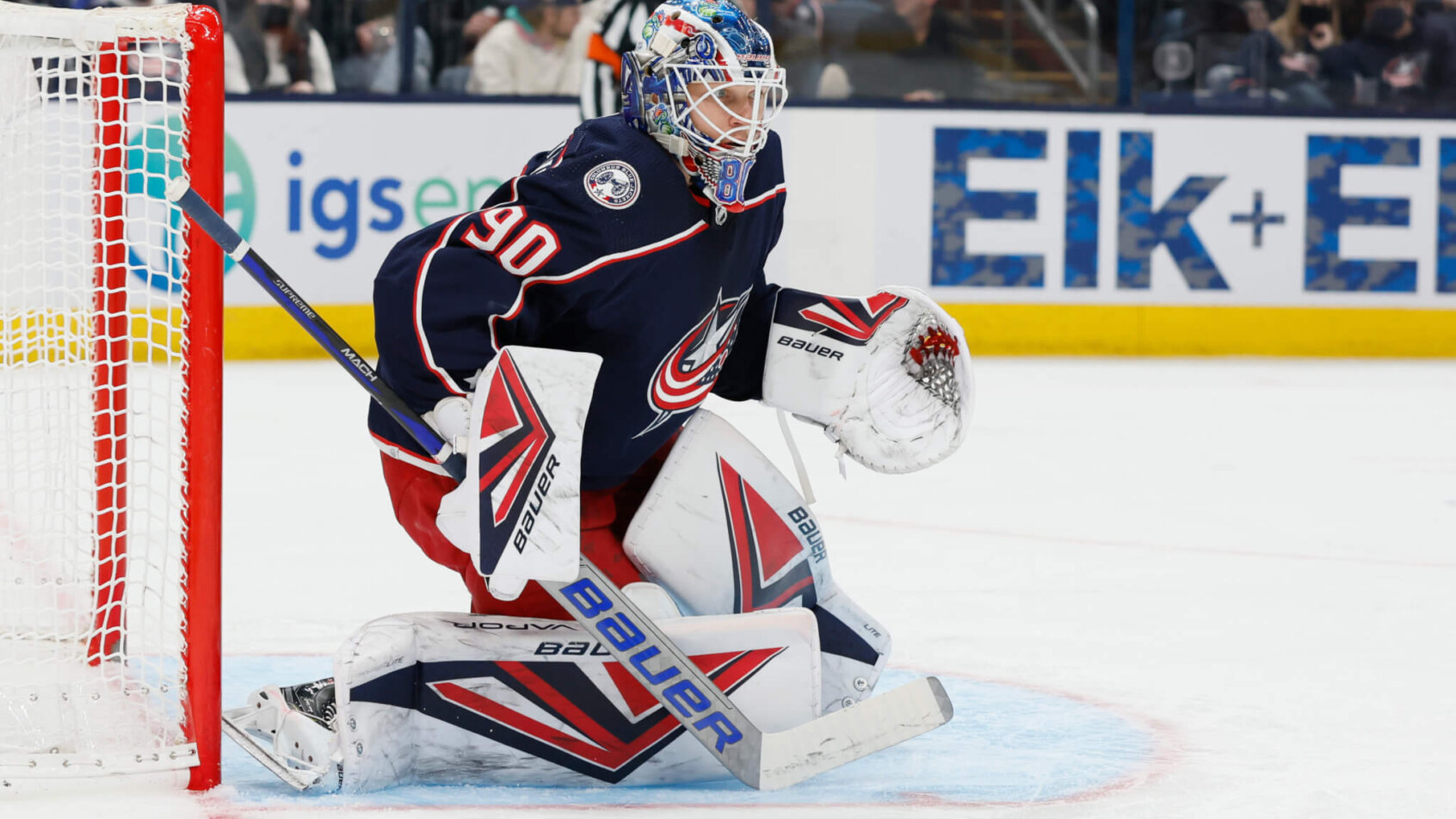 Columbus Blue Jackets' Elvis Merzlikins looking to block a shot during a game.